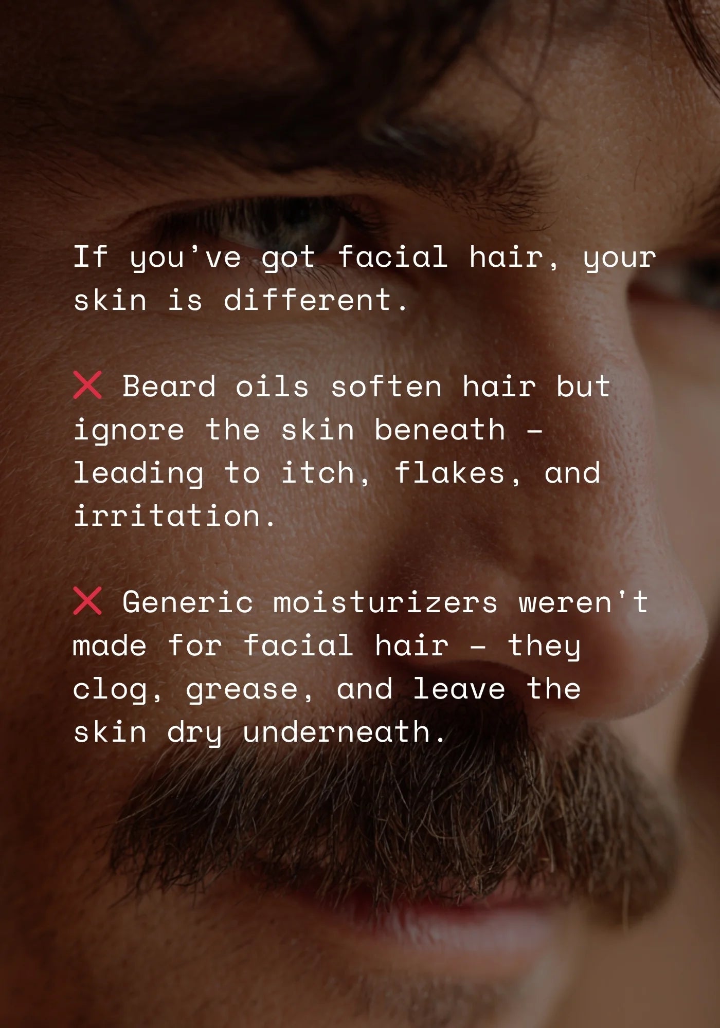 Man with mustache showing why beard oils and generic moisturizers don’t work for facial hair and skin.